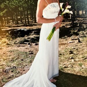 Wedding dress. Worn once, then professionally cleaned and sealed for storage.
